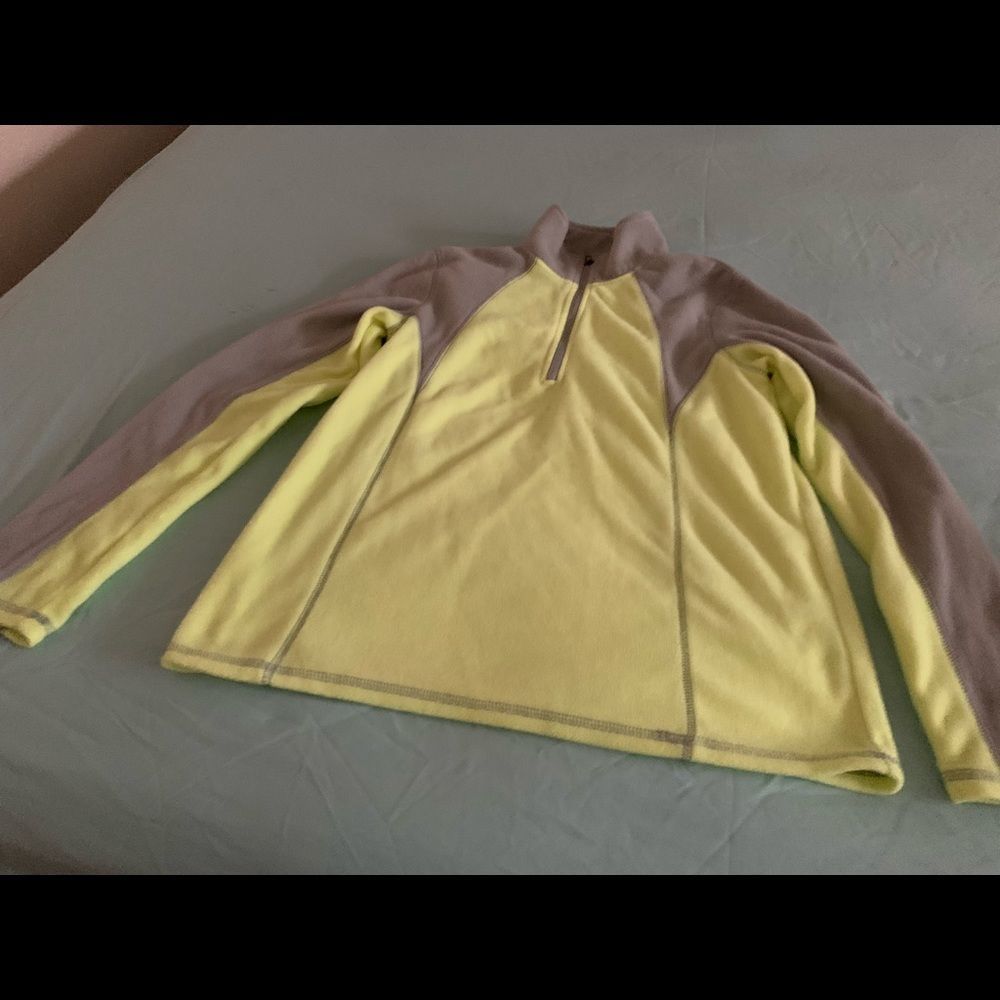 Like green and grey sweater.